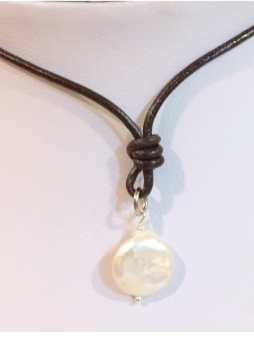 Iridescent White Pearl Pendant Necklace on Brown Leather